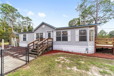 19702 Se 91 St Street, House other with 3 bedrooms, 2 bathrooms and null parking in Ocklawaha FL | Image 1