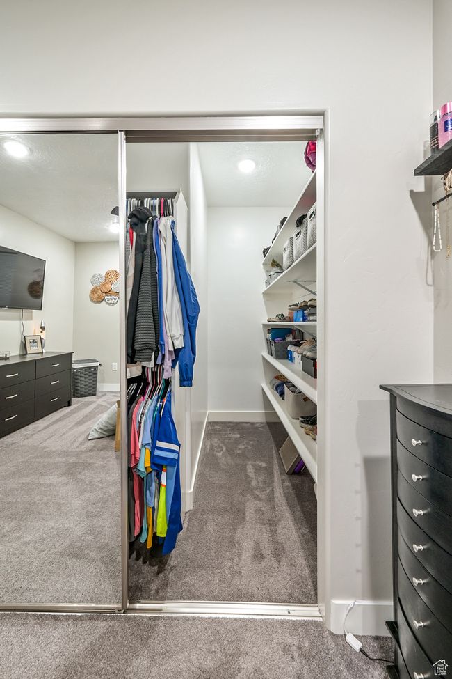 Walk in closet with carpet flooring | Image 74
