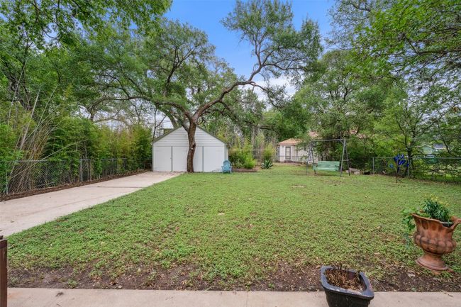 Expansive and private backyard with detached garage or storage shed! | Image 13