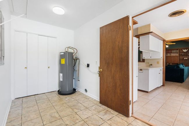 Utilities featuring electric water heater | Image 24