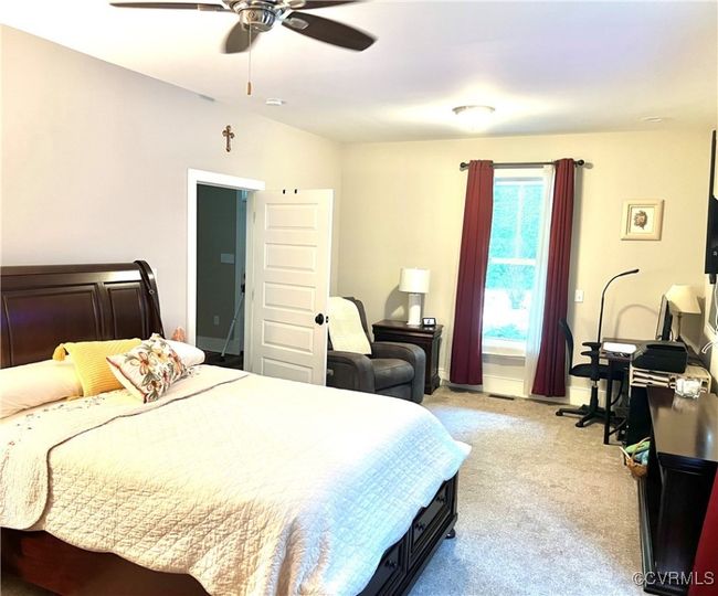 Primary 1st fl Bedroom and ceiling fan | Image 11