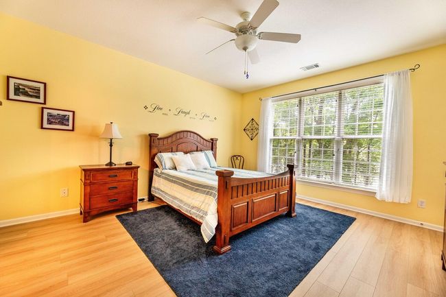 Master Bedroom Overlooking Lake | Image 14