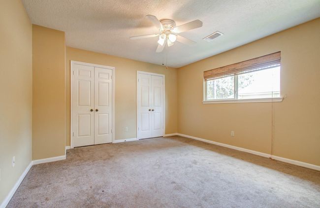 Two closets in secondary bedroom. | Image 34