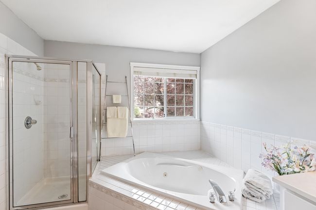 Full bath with a shower stall and a whirlpool tub | Image 24