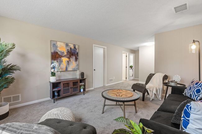 Living Room with Laundry/Mechanical Room Connected | Image 20