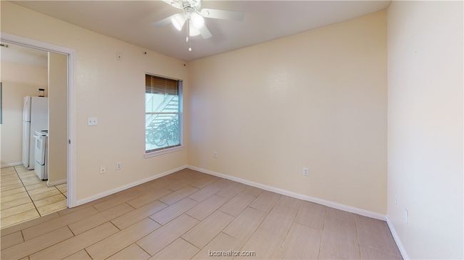 Unfurnished room with light wood-type flooring and ceiling fan | Image 23