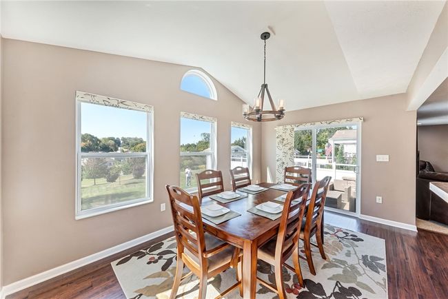 Step outside onto the patio and beautiful yard! | Image 16