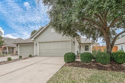 With a freshly power-washed driveway, this home is primed and ready for new owners. Are you ready to explore the inviting interiors that await inside? | Image 3