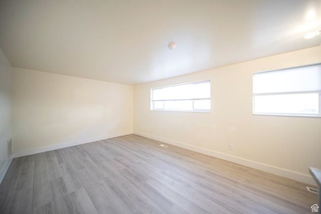 Empty room featuring light hardwood / wood-style flooring | Image 8