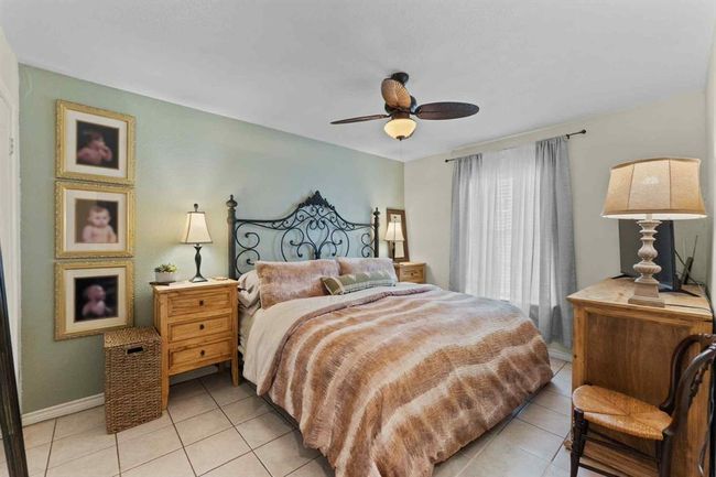 This well-sized bedroom offers flexibility for growing families, remote work, or weekend guests. | Image 20