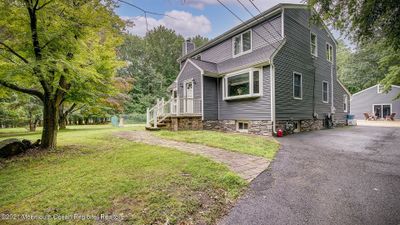 7 Syngle Way, House other with 4 bedrooms, 2 bathrooms and null parking in Morganville NJ | Image 1