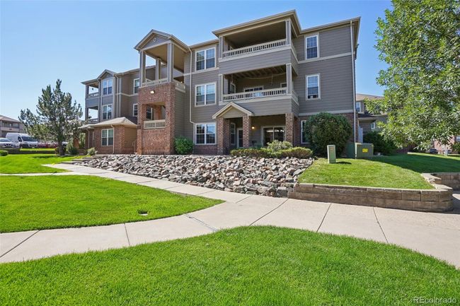 Exterior view of the entire building. For reference, #102 is the one with the patio light on. | Image 35