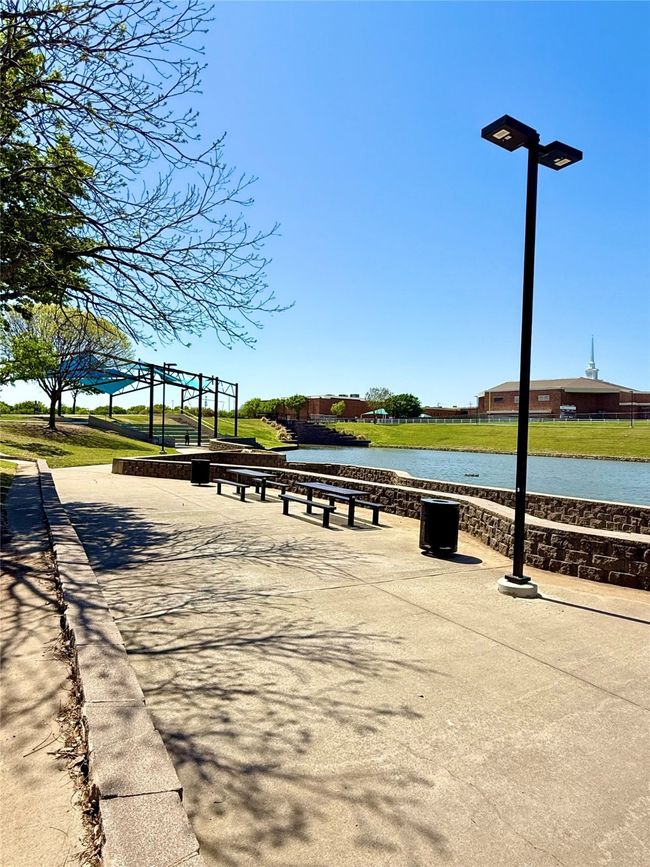 View of community featuring a water view | Image 33