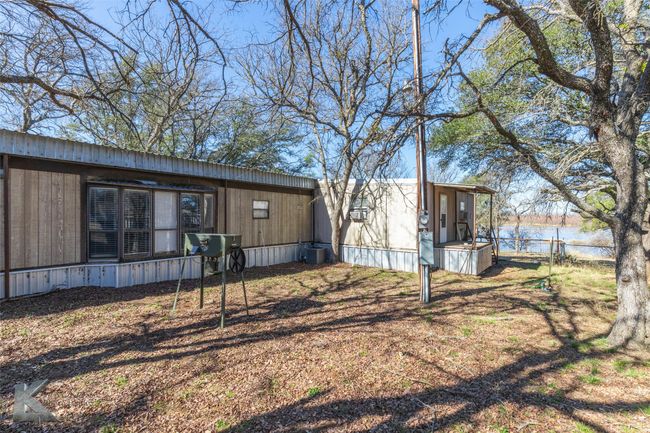 4100 Lake Shore Dr, House other with 3 bedrooms, 2 bathrooms and null parking in May TX | Image 6