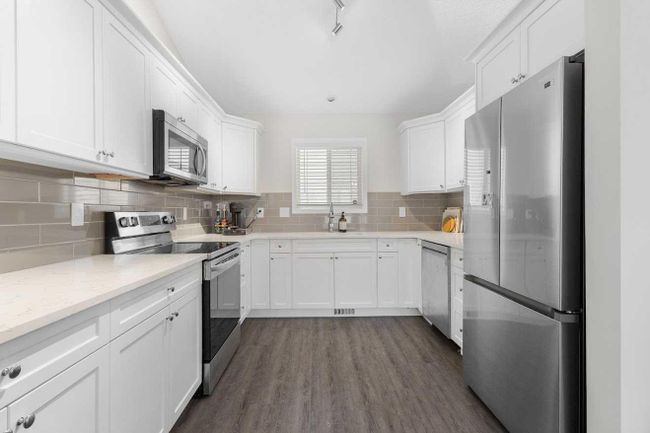 32 Arbour Crest Dr Nw, House detached with 3 bedrooms, 3 bathrooms and 2 parking in Calgary AB | Image 8