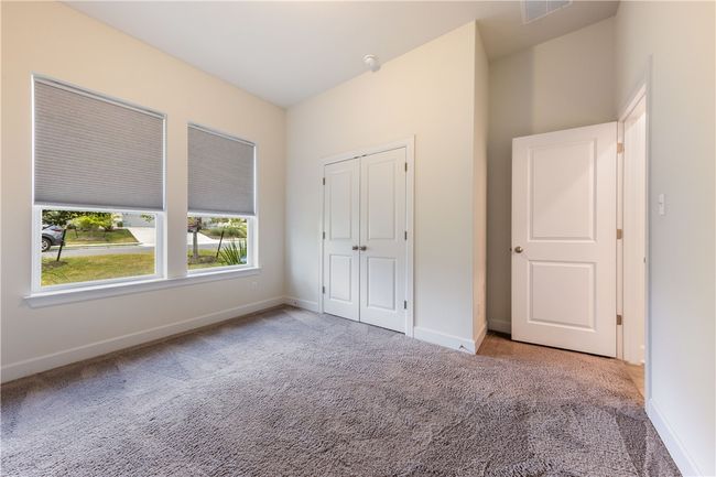Secondary bedroom on first floor - lots of natural light! | Image 19