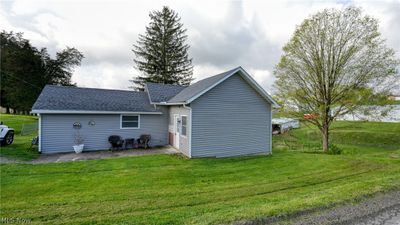 Back of house featuring a yard and a patio area | Image 2