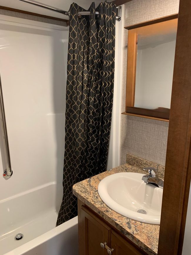 2021 Summit Park Model has nice bathroom with full-sized tub and porcelain toilet. | Image 12