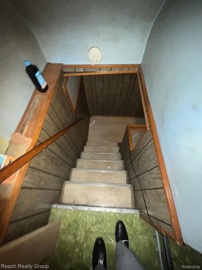 Toward basement from Entry level Common area | Image 19