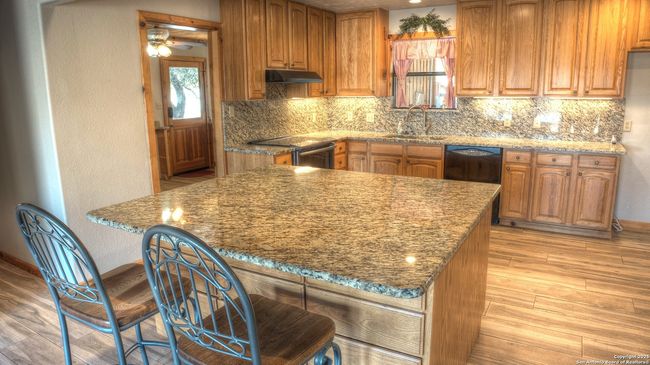 457 N Tomahawk Way, House other with 4 bedrooms, 3 bathrooms and null parking in Concan TX | Image 14
