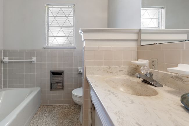 One of three full baths is in the bedroom hall | Image 23