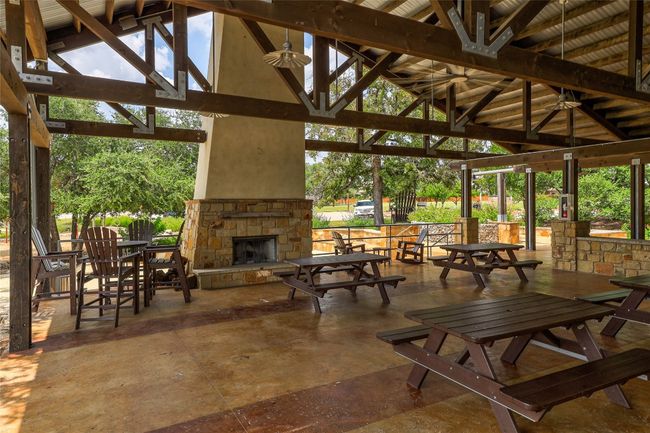 View of patio / terrace featuring a gazebo and an outdoor stone fireplace | Image 38