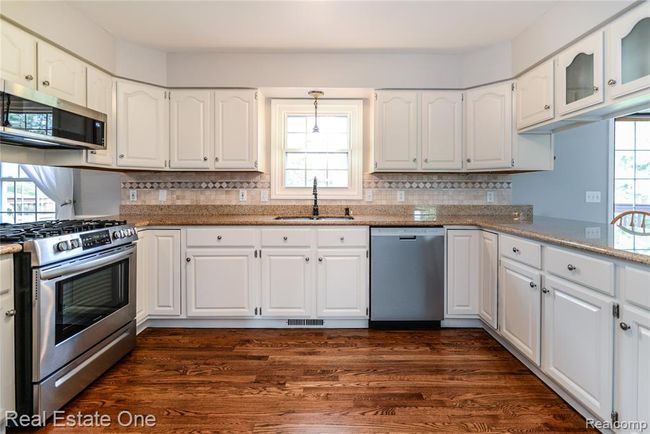 Spacious Kitchen w/Plenty of Cabinet & Counter space | Image 16