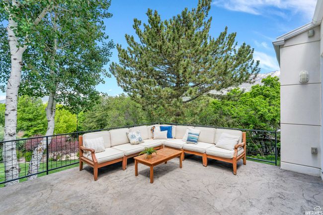 View of patio with an outdoor hangout area | Image 75