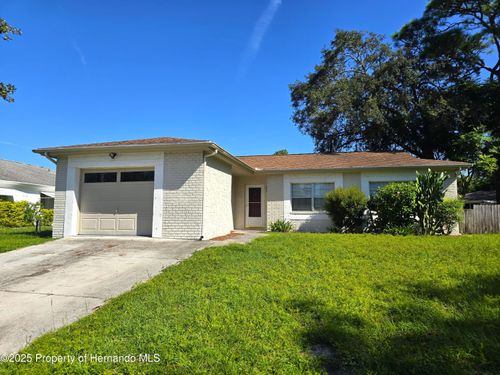 8915 Woodmill Dr, Hudson, FL, 34667-2766 | Card Image