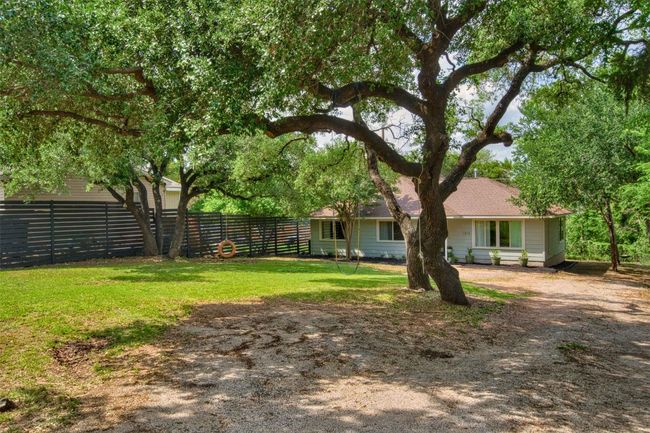 View of yard with fence | Image 14