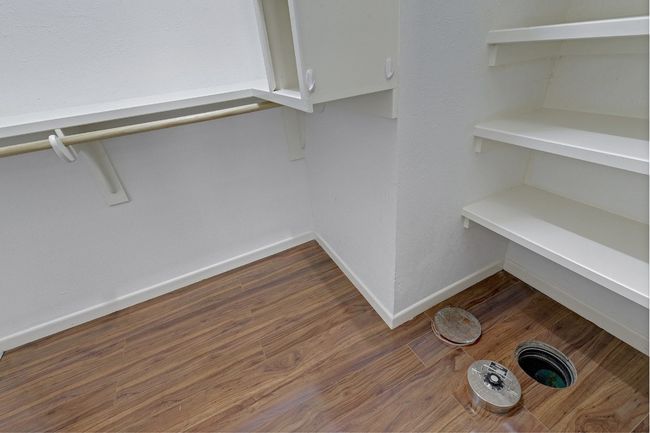 In-ground safe in the primary bedroom. | Image 16