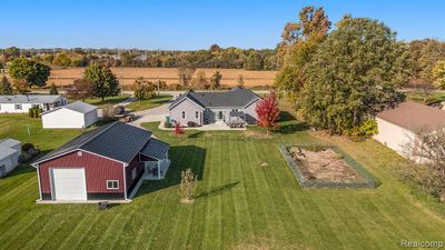 7898 Hough Road, Home with 4 bedrooms, 2 bathrooms and null parking in Almont Twp MI | Image 2