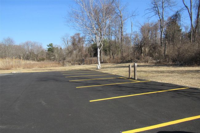 View of uncovered parking lot | Image 13