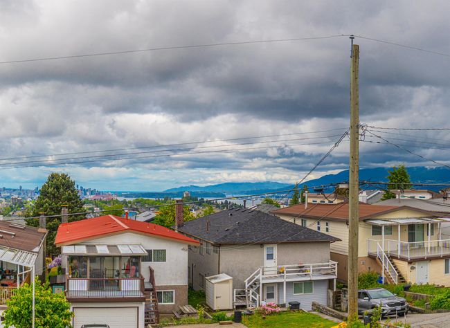 Water view featuring stairway and a mountain backdrop | Image 29