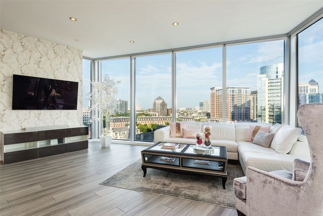 Living room has floor to ceiling windows with electric shades | Image 5