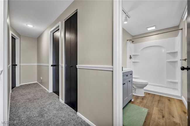 Hall with baseboards and track lighting | Image 20