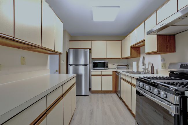 Kitchen with all newer stainless steel appliances | Image 7