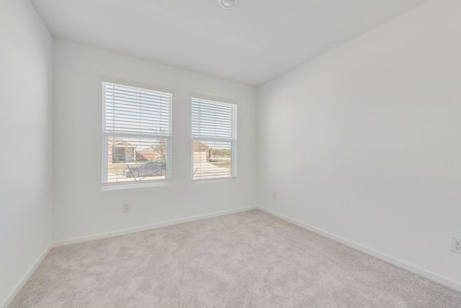 Carpeted empty room with baseboards | Image 15
