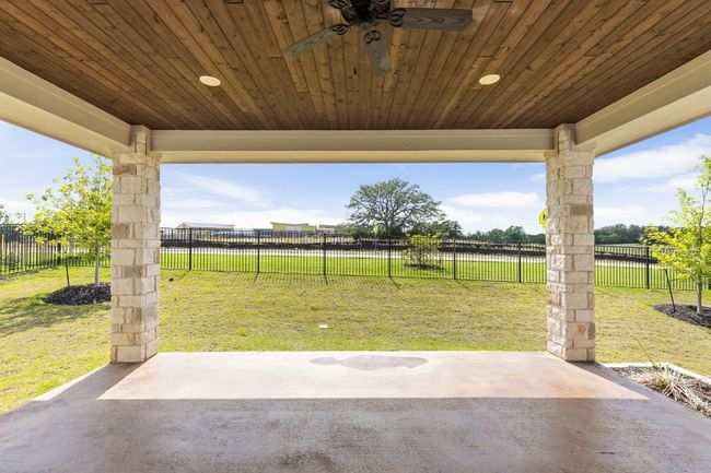 View of patio with ceiling fan | Image 26