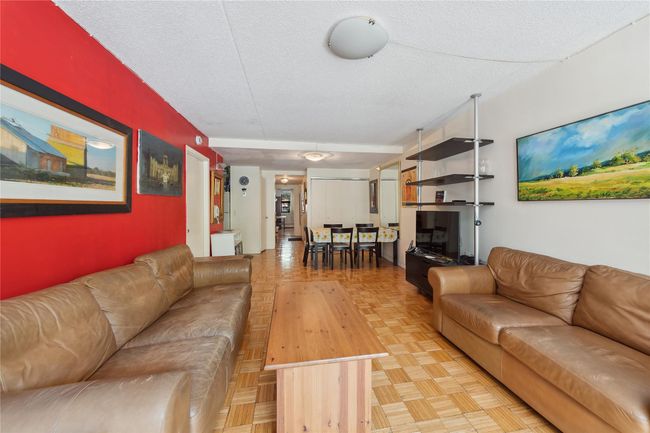 Living room with a textured ceiling | Image 11