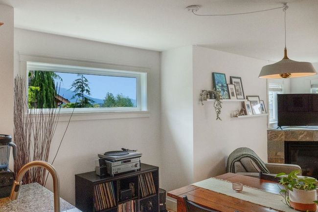 Dining room with mountain view window | Image 10