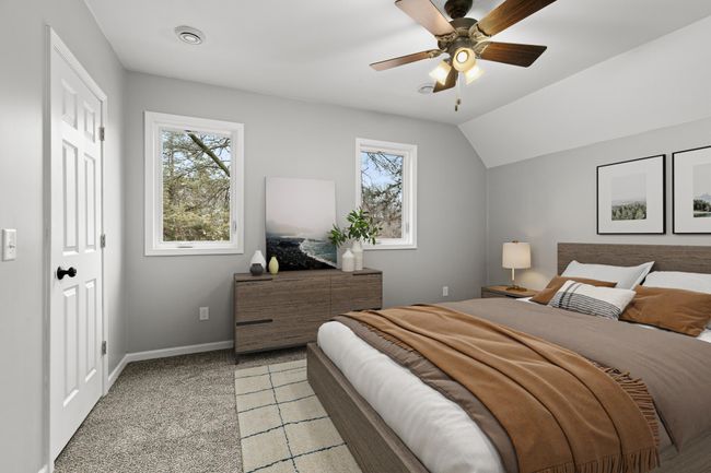 A virtually staged photo of the primary bedroom. | Image 20