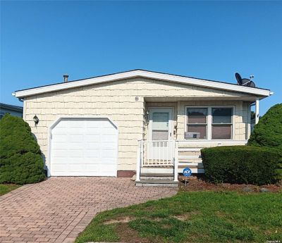 54 - 54 Dogwood Lane, Condo with 2 bedrooms, 2 bathrooms and 2 parking in Manorville NY | Image 1