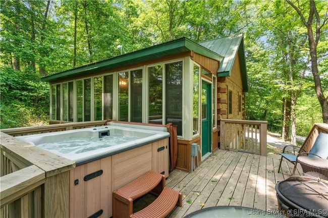Shaded back deck with hot tub | Image 5