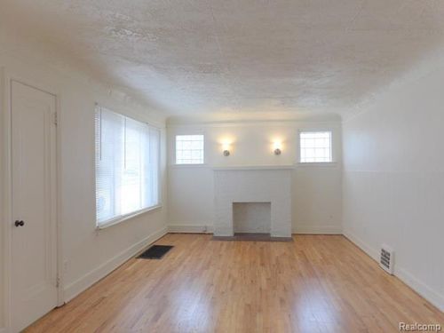 1911 Cora St, Wyandotte, MI, 48192-3923 | Card Image