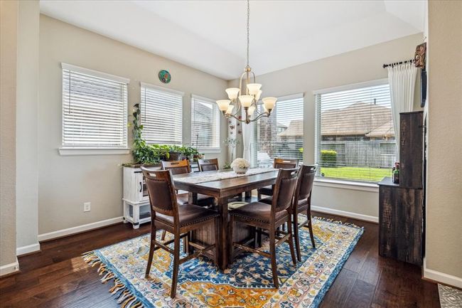 What's not to love about this dining space. Surrounded by light with views to the backyard. | Image 4
