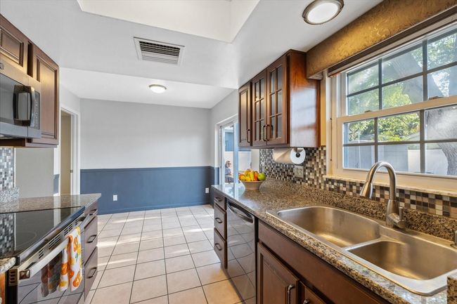 Kitchen looking toward the dining area. | Image 13