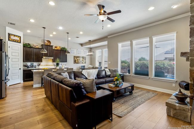 Inviting living room featuring elegant tile floors | Image 16