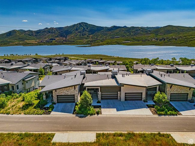 Aerial view of residential area featuring a water and mountain view | Image 34