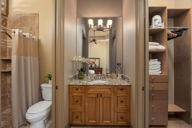 Ensuite Bath servicing second bedroom on main level | Image 63